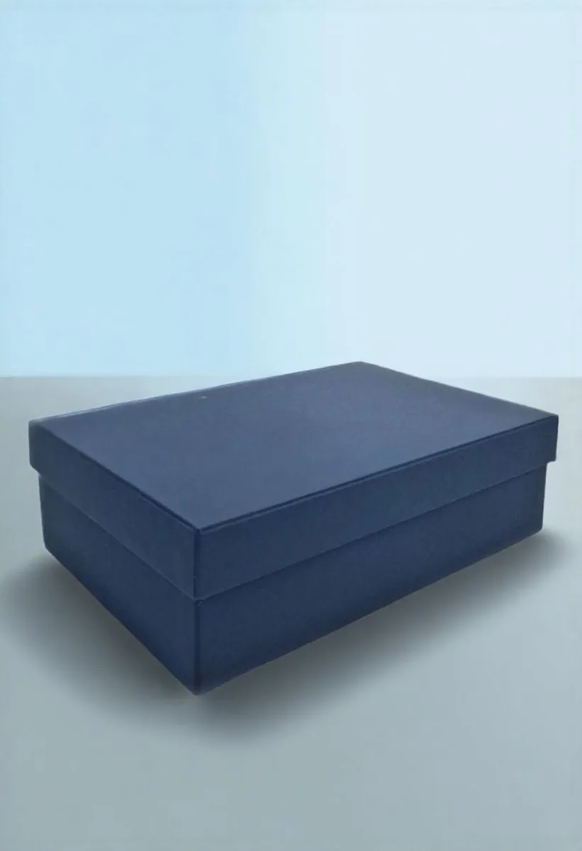 A plain navy two piece product box photographed square on